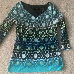 Axcess size S printed top, with sheer long sleeves
